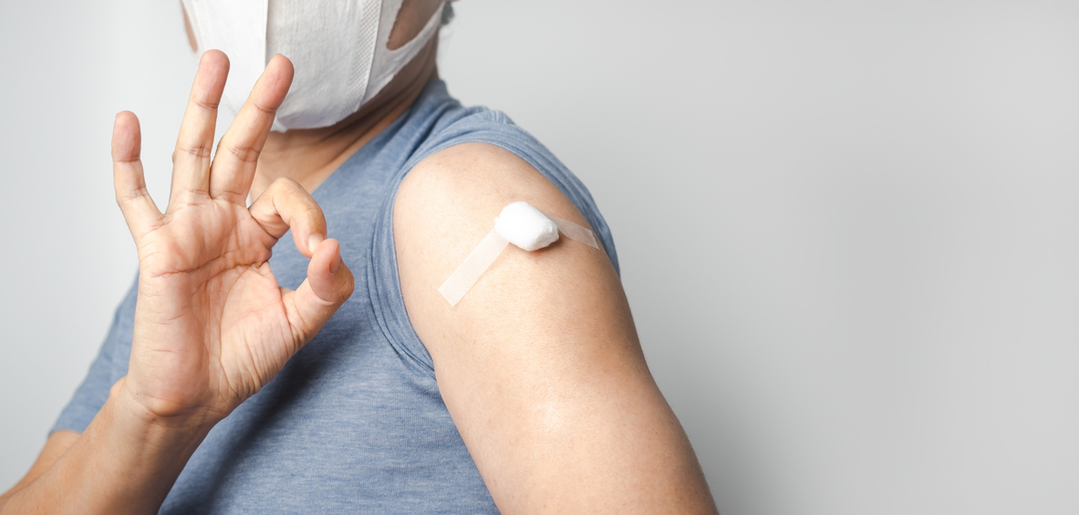 Person with a bandage after yellow fever vaccination